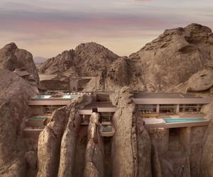 沙特红海畔沙漠岩石度假村：自然与设计共舞，建筑融于山脉